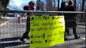 Picket line with metal safety gate at Glendon campus